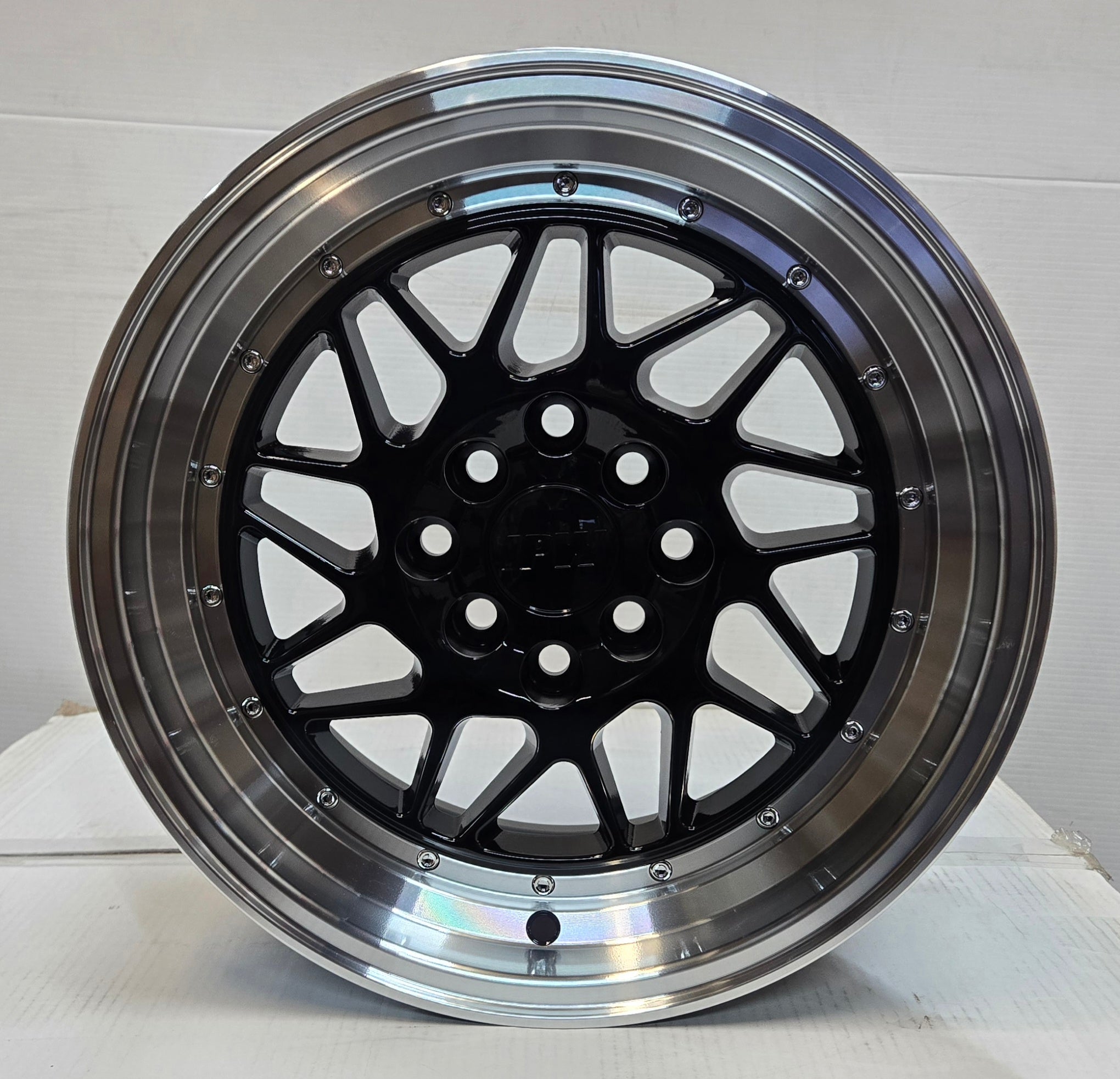 W010 15X8.0 4X100 4X114.3 BLACK MACHINED FACE CB73.1 ET30