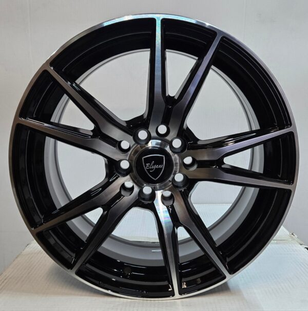 5457 ELEGANT E-001 16x7.0 5x100 / 5x114.3 PIANO BLACK MACHINE