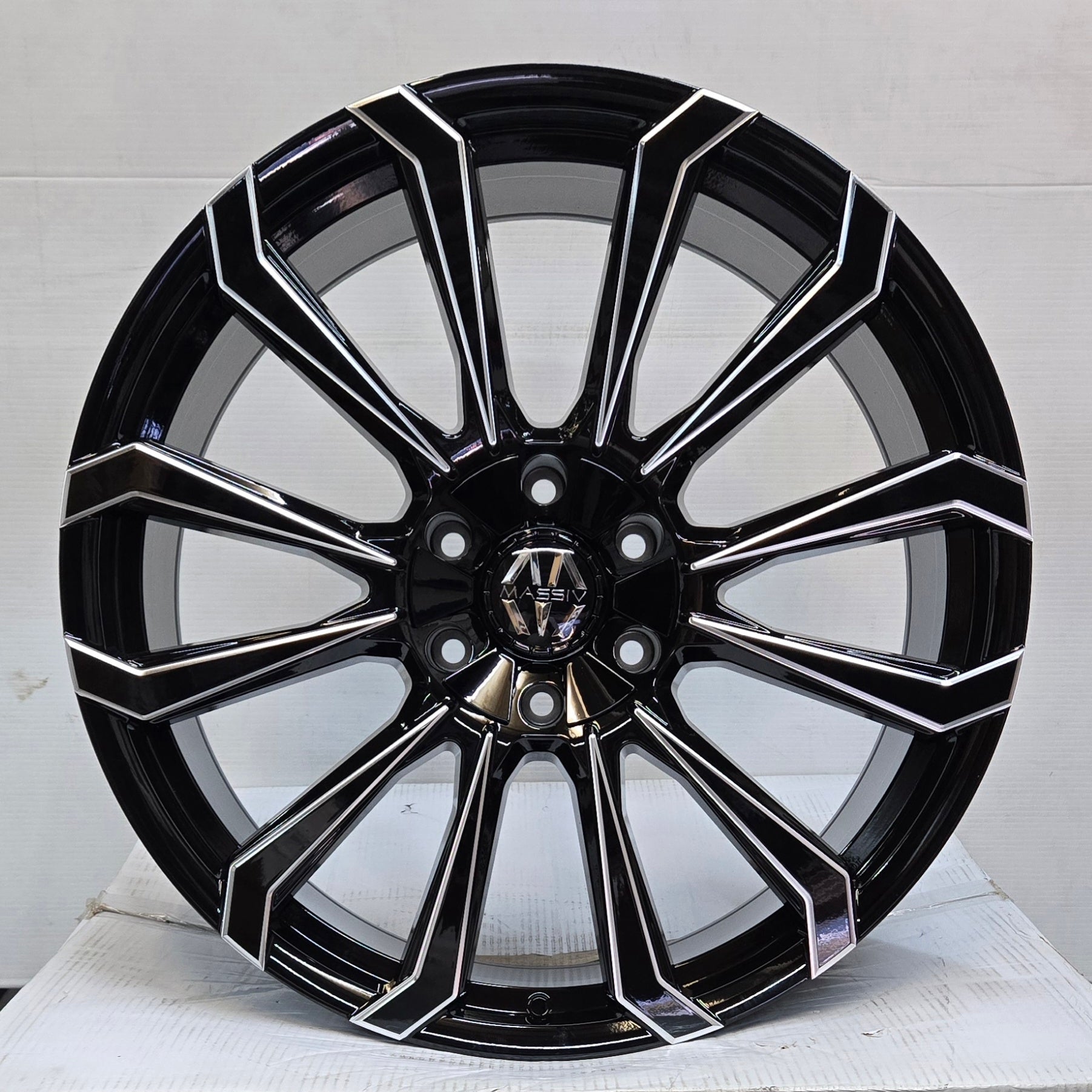 MAS929 22X9.5 6X139.7 6X135 BLACK MILLED TITAN CB 87.1 ET25