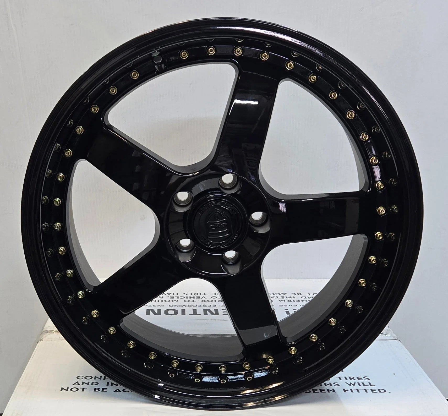 GWG NS8 19x8.5 GLOSS BLACK GOLD RIVETS CB74.1 ET32